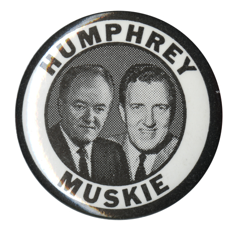 Round, black and white button with portraits of Hubert Humphrey and Edmund Muskie. Black text reads "Humphrey Muskie."