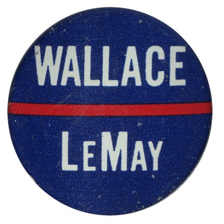 Round, blue button bisected by a red stripe. White text reads "Wallace LeMay."