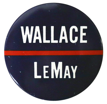 Round, blue button bisected by a red stripe. White text reads "Wallace LeMay."