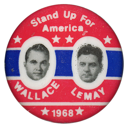 Round, red button with portraits of George Wallace and Curtis LeMay alone a blue band. White text reads "Stand up for America, Wallace, LeMay, 1968."
