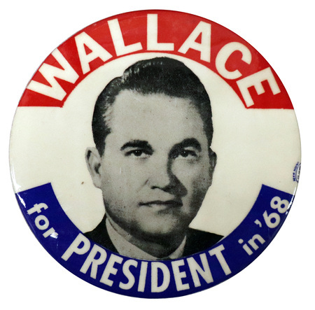 Round, white button with a portrait of George Wallace. Red and blue bands along the edge of the button contain white text reading "Wallace for President in '68."