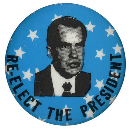 Round, blue button with white stars and a black and white portrait of Richard nixon. Black text reads "RE-ELECT THE PRESIDENT"