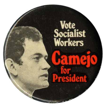 Round, black button with a black and white portrait of Peter Camejo and red and white text reading "Vote Socialist Workers Camejo for President"