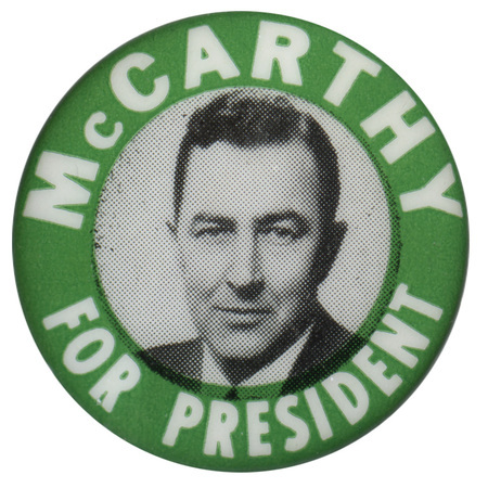 Round button with green band around the edge and a black and white portrait of Eugene McCarthy. White text reads "McCARTHY FOR PRESIDENT"