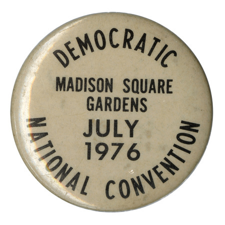 Round, off white button with black text reading "DEMOCRATIC NATIONAL CONVENTION MADISON SQUARE GARDENS JULY 1976"