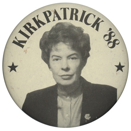 Round, white button with a black and white photograph of Jeane Kirkpatrick. Black text reads "KIRKPATRICK"