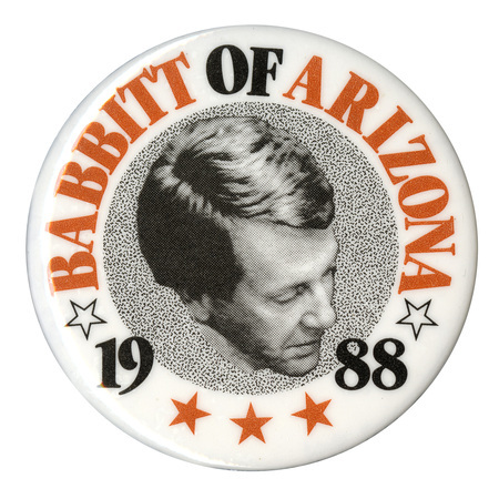 Round, white button with a black and white photograph of Bruce E. Babbitt from above. Brown and black text reads "BABBITT OF ARIZONA 1988"