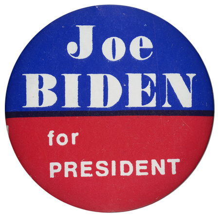 Round button with a blue upper half and red lower half. White text reads "Joe BIDEN for PRESIDENT"