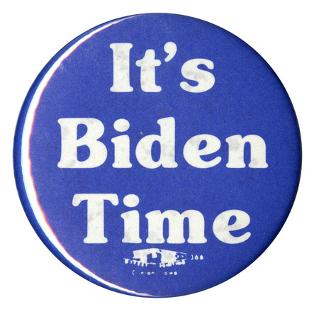 Round, blue button with white text reading "It's Biden Time"