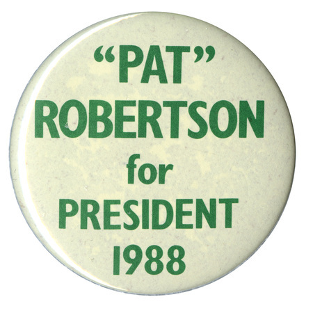 Round, white button with green text reading ""PAT" ROBERTSON for PRESIDENT 1988"