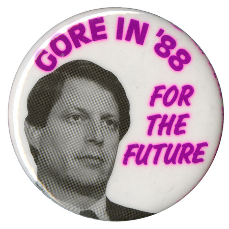 Round, white button with a black and white photograph of Al Gore. Purple text reads "GORE IN '88 FOR THE FUTURE"