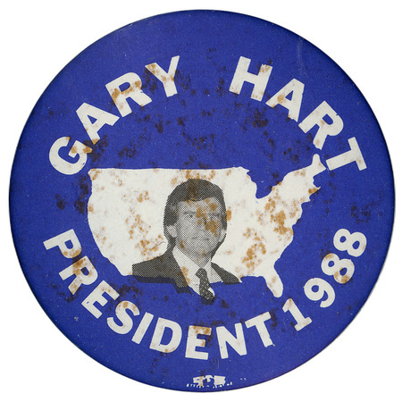 Round, blue button with a black and white photograph of Gary Hart within a white outline of the United States. White text reads "GARY HART PRESIDENT 1988"