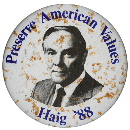 Round, white button with a black and white photograph of Alexander Haig and blue text reading "Preserve American Values Haig '88"