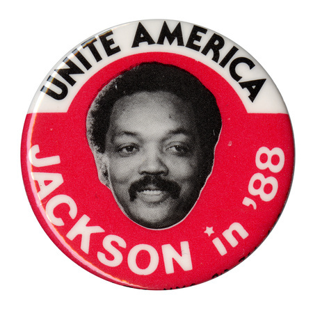 Round, red button with a black and white photograph of Jesse Jackson. Black and white text reads "UNITE AMERICA JACKSON in '88"