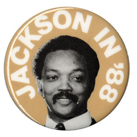 Round, beige button with a black and white photograph of Jesse Jackson. White text reads "JACKSON IN '88"