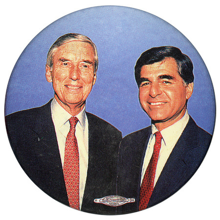 Round button with a color photograph of Lloyd Bentsen and Michael Dukakis
