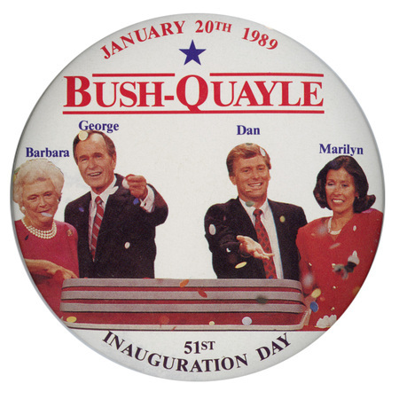 Round, white button with a color photograph of Barbara and George H. W. Bush and Dan and Marilyn Quayle, each with their name above their head. Red and black text reads "JANUARY 20th 1989 BUSH-QUAYLE 51st INAUGURATION DAY"
