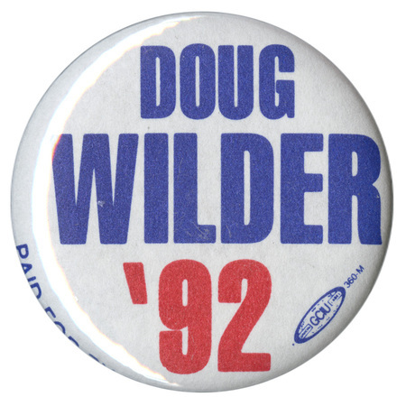 Round, white button with blue and red text reading "DOUG WILDER '92"