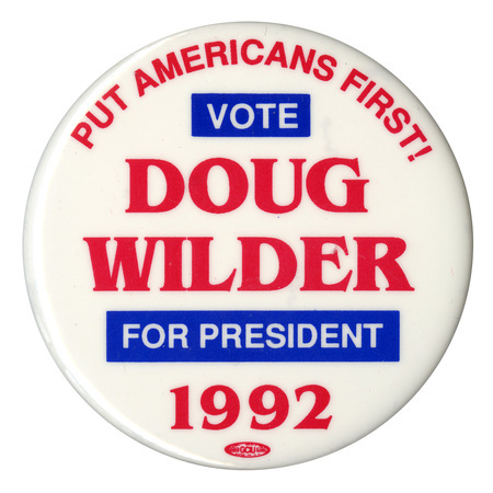 Round, white button with red and blue text reading "PUT AMERICANS FIRST! VOTE DOUG WILDER FOR PRESIDENT 1992"
