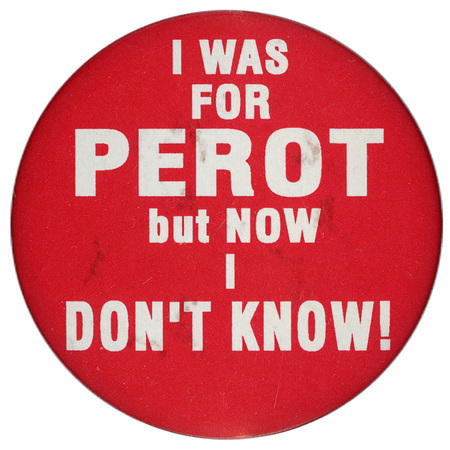 Round, red button with white text reading "I WAS FOR PEROT but NOW I DON'T KNOW"