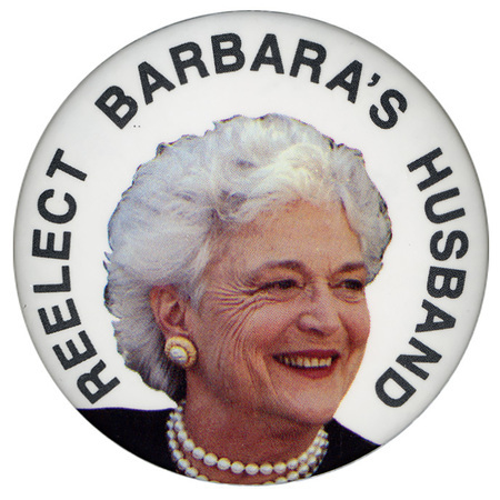 Round, white button with a color photograph of Barbara Bush and black text reading "REELECT BARBARA'S HUSBAND"