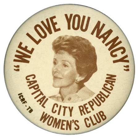 Round, white button with a black and white photograph of Nancy Reagan and black text reading ""WE LOVE YOU NANCY" CAPITAL CITY REPUBLICAN WOMEN'S CLUB"