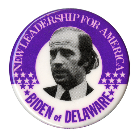 Round, purple and white button with a black and white photograph of Joseph R. Biden, Jr., and purple and white stars. White and purple text reads "NEW LEADERSHIP FOR AMERICA BIDEN of DELAWARE"
