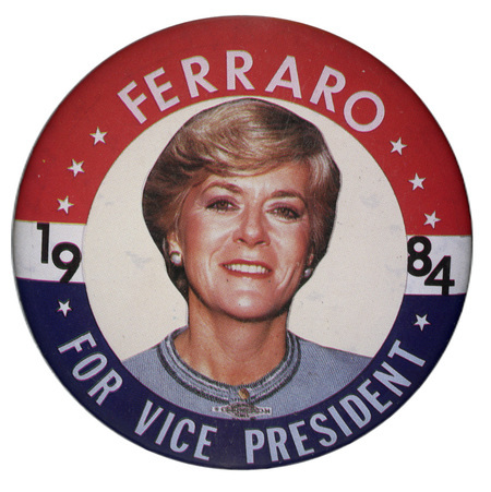 Round button with red and blue border and a color photograph of Geraldine Ferraro in the center. White and blue text reads "FERRARO 1984 FOR VICE PRESIDENT"