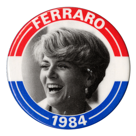 Round button with red and blue border and a black and white photograph of Geraldine Ferraro. White text reads "FERRARO 1984"