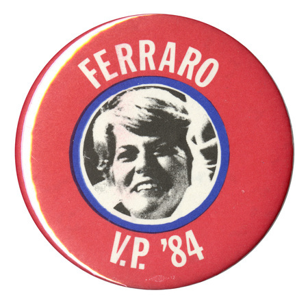 Round, red button with a black and white photograph of Geraldine Ferraro within a blue circle. White text reads "FERRARO V.P. '84"
