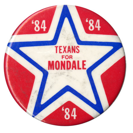 Round button with a large blue and white star on a red field. White and red text reads "'84 '84 '84 TEXANS FOR MONDALE"