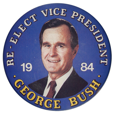 Round, blue button with a color photograph of George H. W. Bush. White and yellow text reads "RE-ELECT VICE PRESIDENT 1984 GEORGE BUSH"