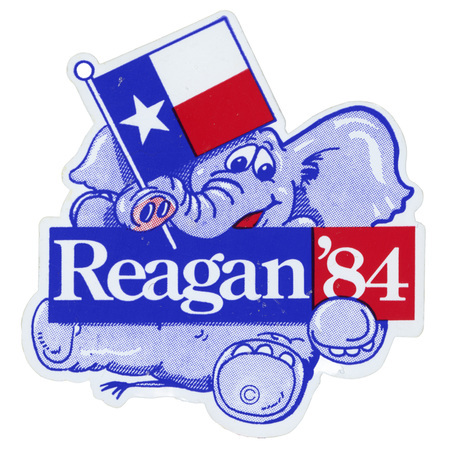 Button in the shape of a blue elephant holding the Texas state flag and a sign reading "Reagan '84"