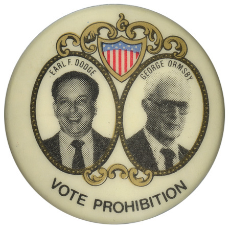 Round, white button with black and white photographs of Earl F. Dodge and George Ormsby, each with his name above his photograph. Black text at the bottom of the button reads "VOTE PROHIBITION"
