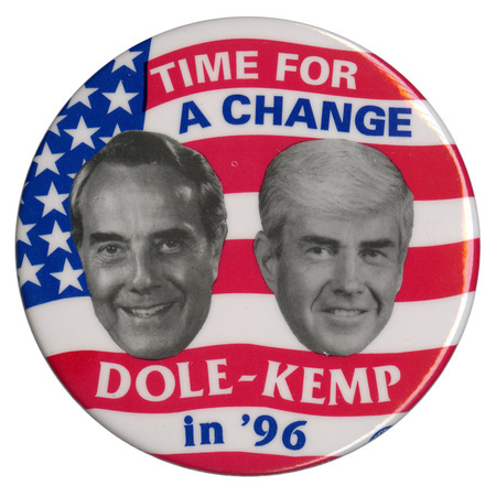 Round button with black and white photographs of Bob Dole and Jack Kemp against the red, white, and blue stars and stripes of the US flag. White and blue text reads "TIME FOR A CHANGE DOLE-KEMP in '96"