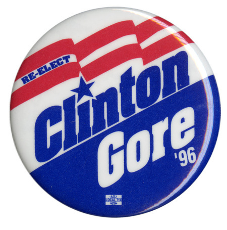 Round, white and blue button with red stripes. Blue and white text reads "RE-ELECT Clinton Gore '96"