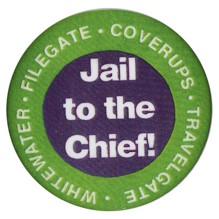 Round button with a green border and black center. White text reads "Jail to the Chief! WHITEWATER FILEGATE COVERUPS TRAVELGATE"