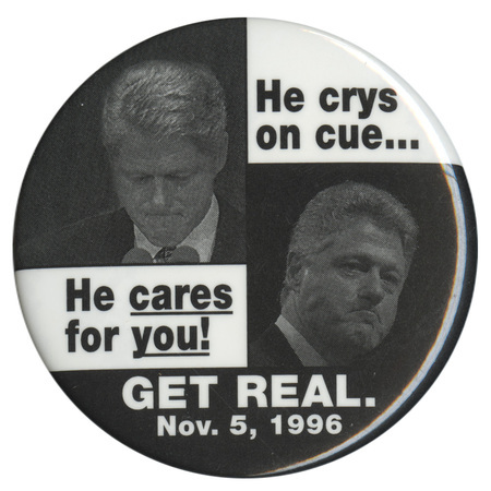Round button with two black and white photographs of Bill Clinton. Black and white text reads "He crys on cue...He care for you! GET REAL. Nov. 5, 1996"