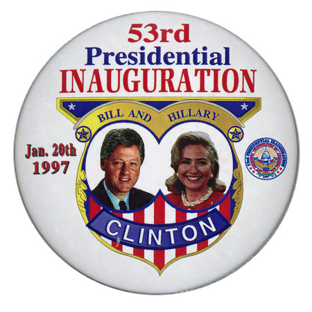 Round, white button with color photographs of Bill and Hillary Clinton inside an elaborate gold, red, white, and blue frame. Red, white, and blue text reads "53rd Presidential INAUGURATION BILL AND HILLARY CLINTON Jan. 20th 1997"