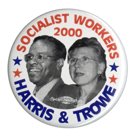 Round, white button with black and white photographs of James Harris and Margaret Trowe. Red and blue text reads "SOCIALIST WORKERS 2000 HARRIS & TROWE"