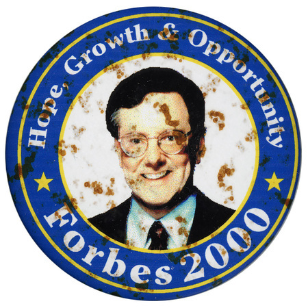 Round button with a blue and yellow border and a white center with a color photograph of Steve Forbes. White text reads "Hope, Growth & Opportunity Forbes 2000"