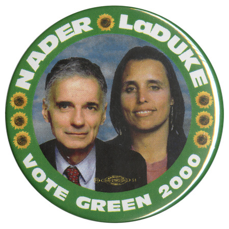 Round button with a green border containing color photographs of sunflowers and white text reading "NADER LaDUKE VOTE GREEN 2000". In the center are color photographs of Ralph Nader and Winona LaDuke.