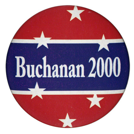 Round button with red and blue sections and white stars. White text reads "Buchanan 2000"