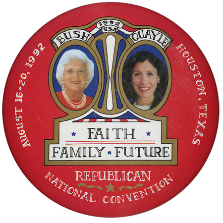 Round, red button with color photographs of Barbara Bush and Marilyn Quayle surrounded by an elaborate red, white, blue, and gold frame. White and black text reads "BUSH QUAYLE 1992 USA AUGUST 16-20, 1992 HOUSTON, TEXAS REPUBLICAN NATIONAL CONVENTION FAITH FAMILY FUTURE"