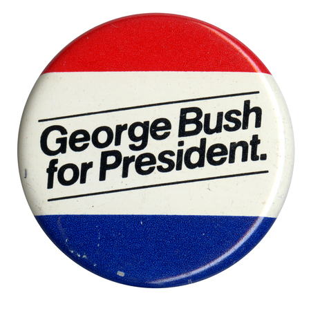Round button with horizontal bands of red, white, and blue. Black text reads "George Bush for President."