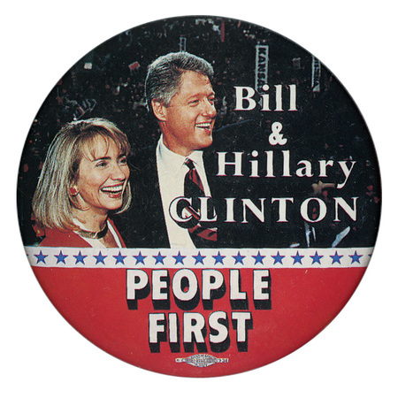 Round button with a color photograph of Hillary and Bill Clinton. White text reads "Bill & Hillary Clinton PEOPLE FIRST"