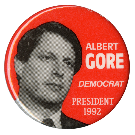 Round, orange button with a black and white photograph of Al Gore. White text reads "ALBERT GORE DEMOCRAT PRESIDENT 1992"
