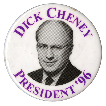 Round, white button with a black and white photograph of Dick Cheney. Purple text reads "DICK CHENEY PRESIDENT '96"