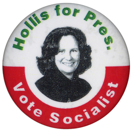 Round, white button with a band of red along the bottom. A black and white photograph of Mary Cal Hollis is in the center. Green and white text reads "Hollis for Pres. Vote Socialist"
