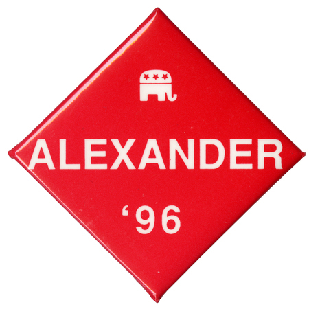 Diamond-shaped, red button with a white drawing of the GOP elephant symbol and white text reading "ALEXANDER '96"